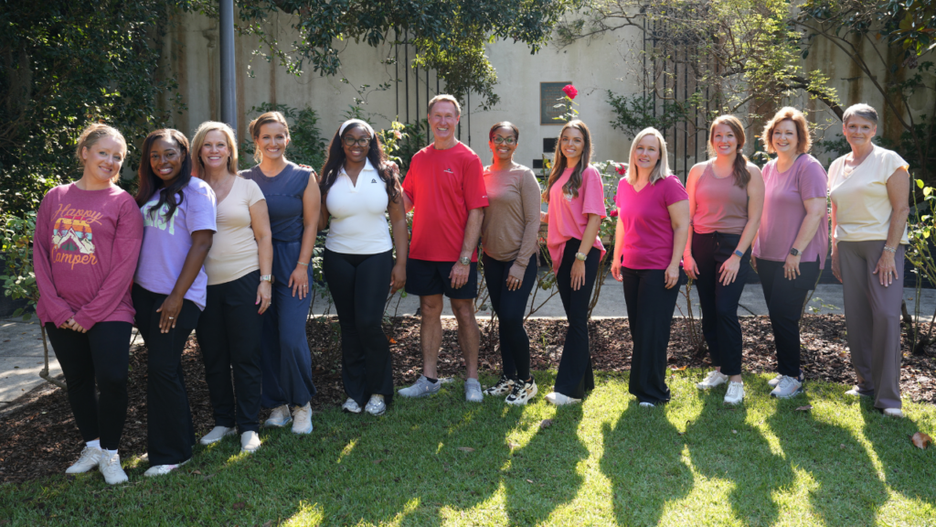 Dr Ricky Lane with the Team