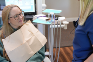 Woman undergoing saliva testing during a dental appointment at Lane Dentistry to evaluate oral health and support personalized treatment.