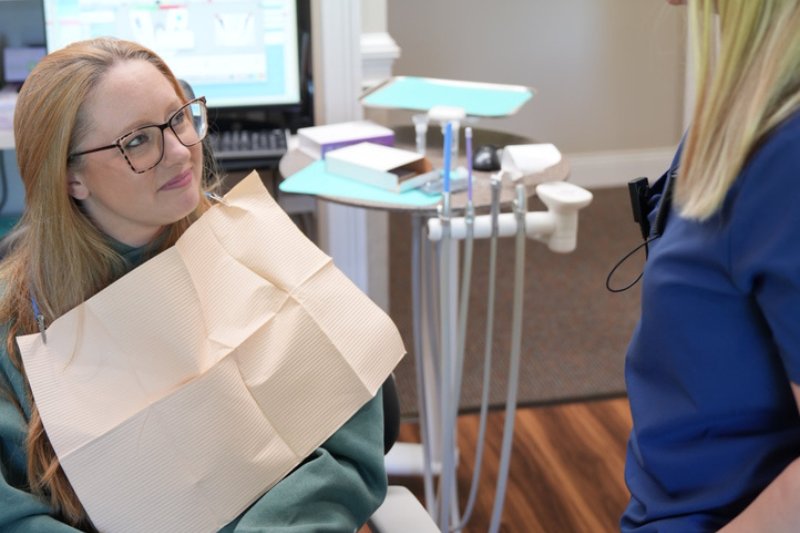 Woman undergoing saliva testing during a dental appointment at Lane Dentistry to evaluate oral health and support personalized treatment.